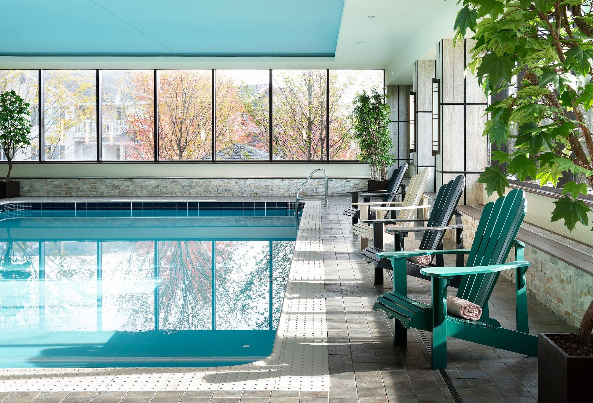 Coleman pool with lounge seating beside the water